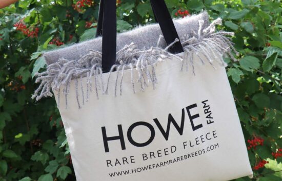 Branded tote bag and wool throw for Howe Farm Rare Breed Fleece, featuring logo and identity design by Montpellier Creative